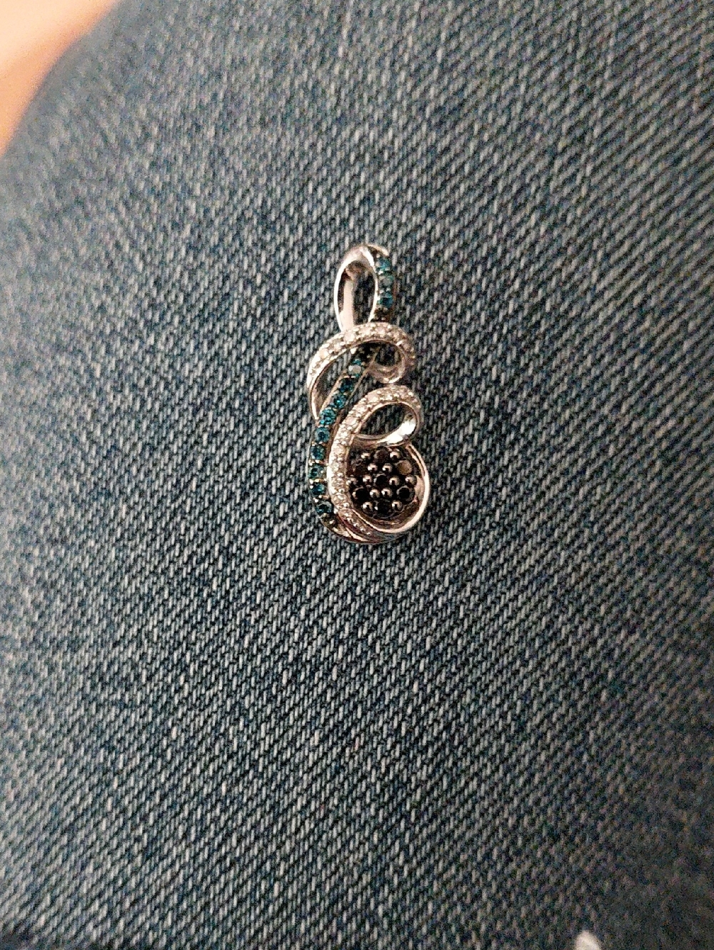 White 10k Gold Teardrop Pendant with White, Blue & Black Diamonds.